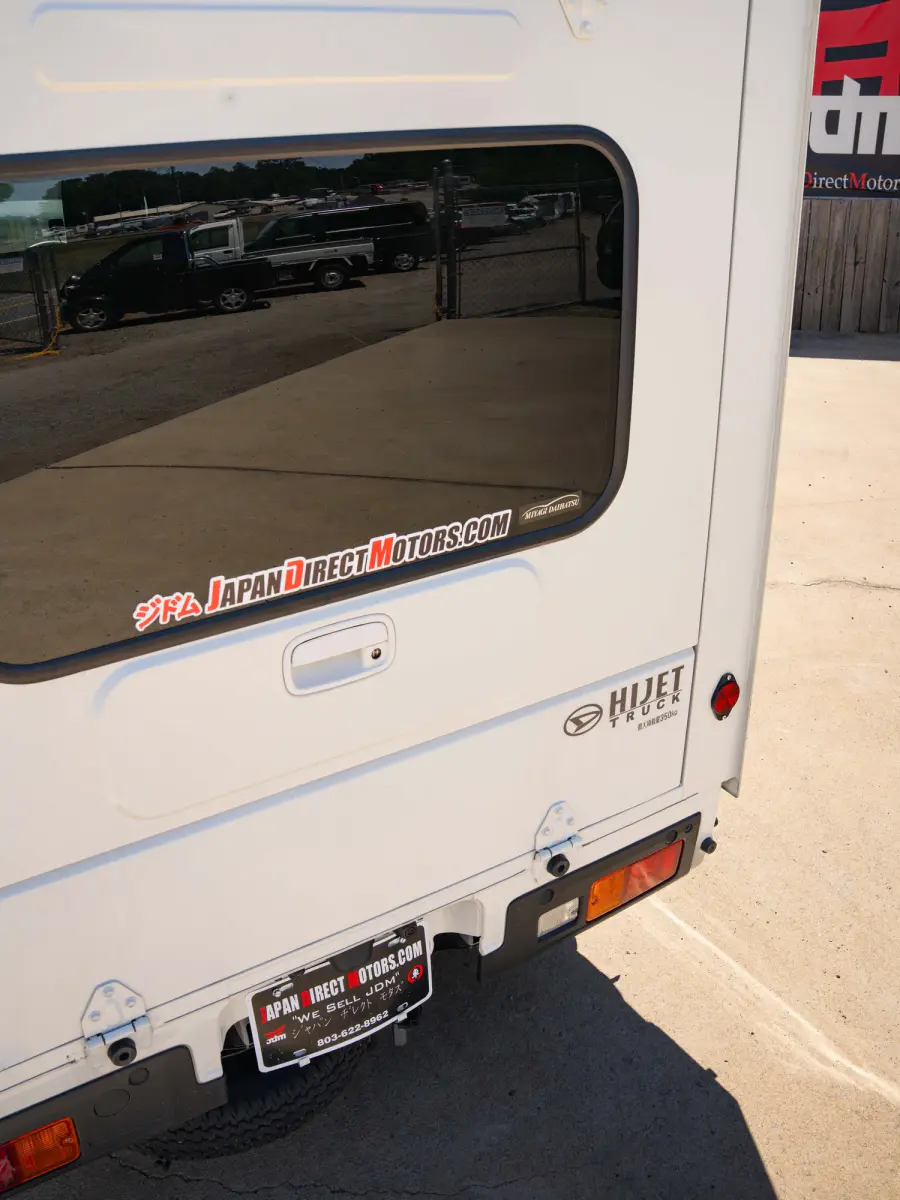 2023 Daihatsu Hijet, a black off-road Kei Truck, for sale at Japan Direct Motors in Irmo, SC (photo 18 of 19)