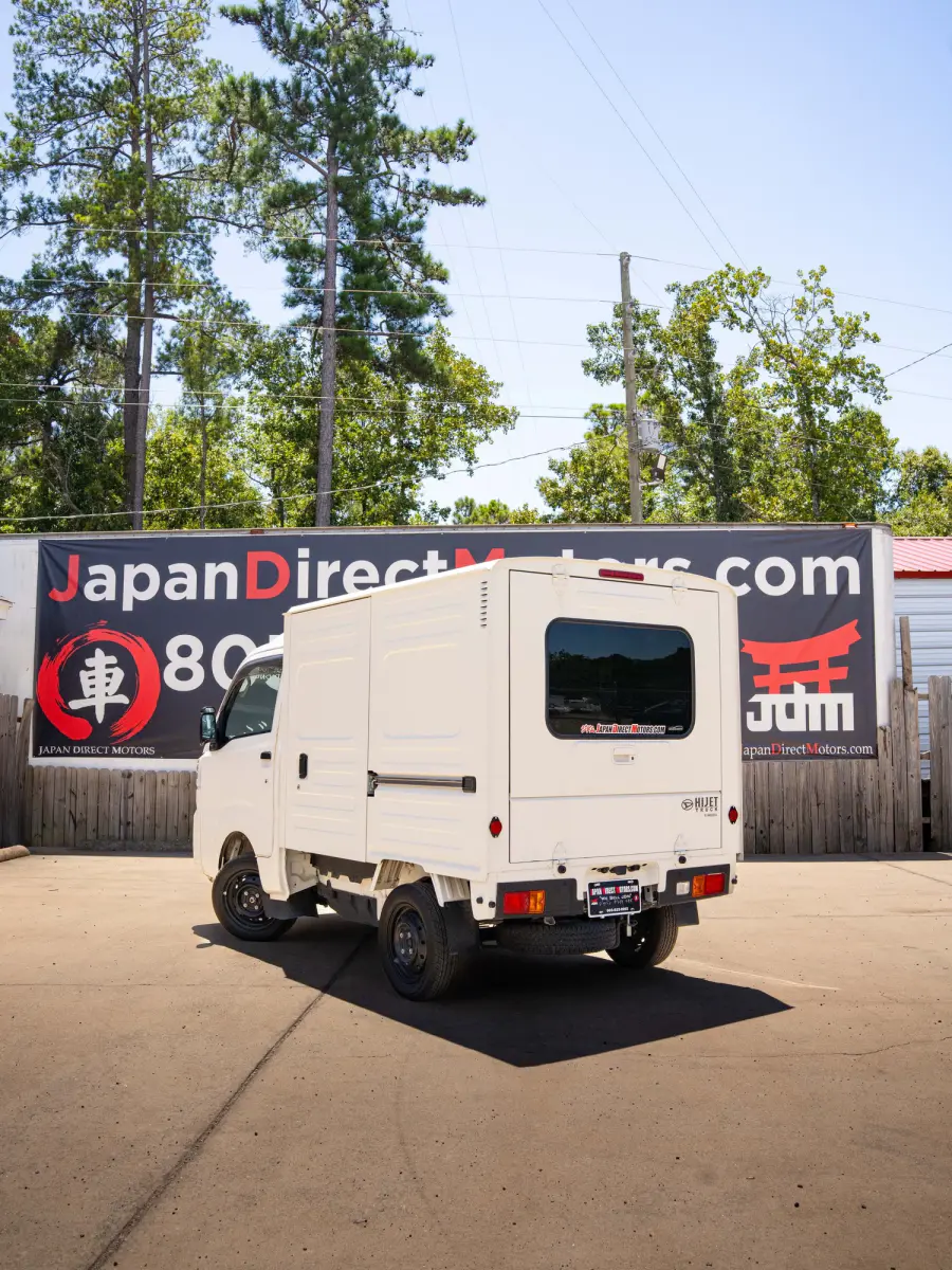 2023 Daihatsu Hijet, a black off-road Kei Truck, for sale at Japan Direct Motors in Irmo, SC (photo 2 of 19)