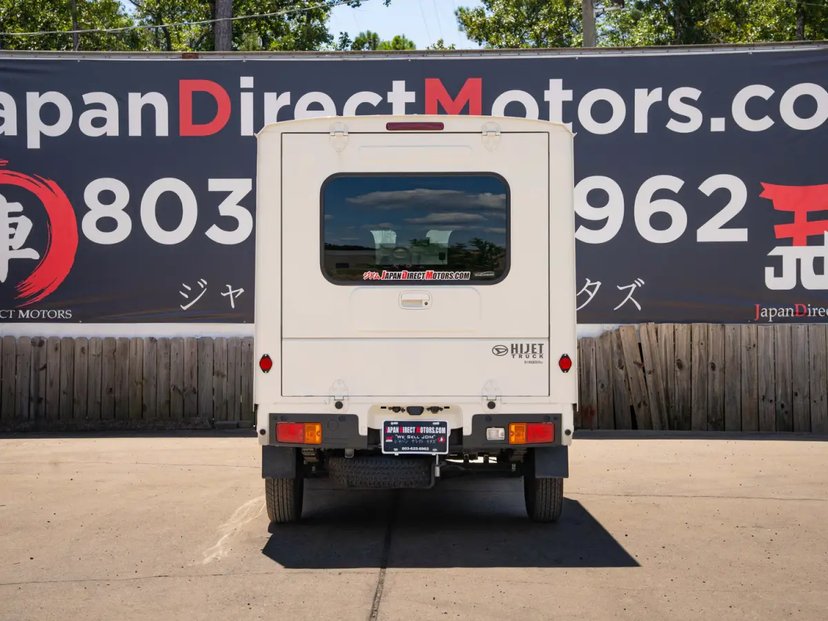 2023 Daihatsu Hijet, a black off-road Kei Truck, for sale at Japan Direct Motors in Irmo, SC (photo 8 of 19)