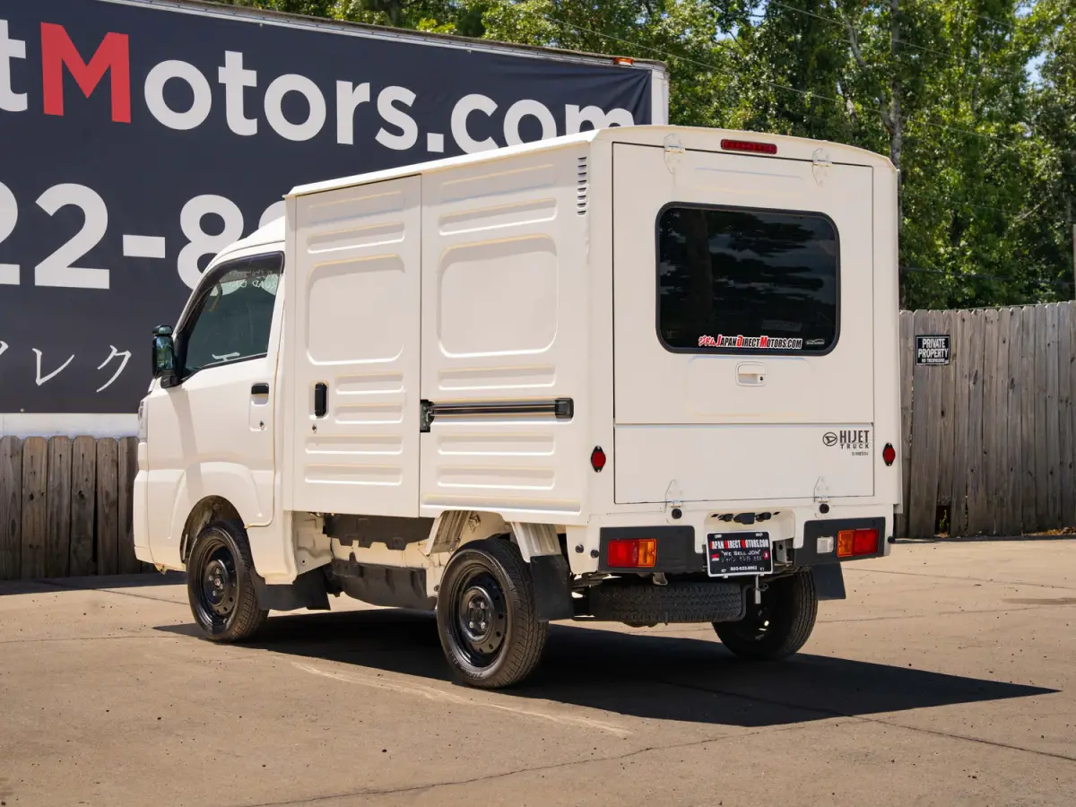 2023 Daihatsu Hijet, a black off-road Kei Truck, for sale at Japan Direct Motors in Irmo, SC (photo 9 of 19)