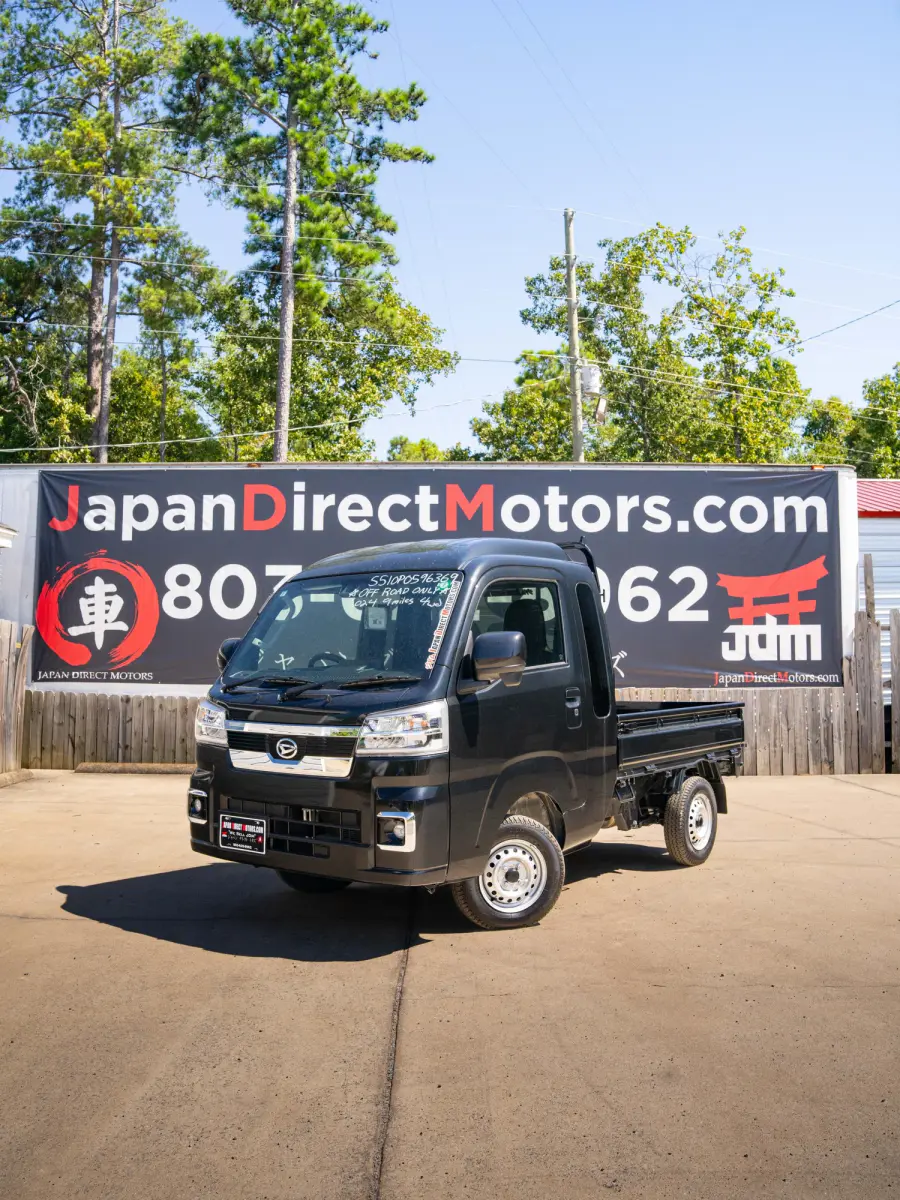 2024 Daihatsu Hijet, a black off-road Kei Truck, for sale at Japan Direct Motors in Irmo, SC (photo 1 of 13)