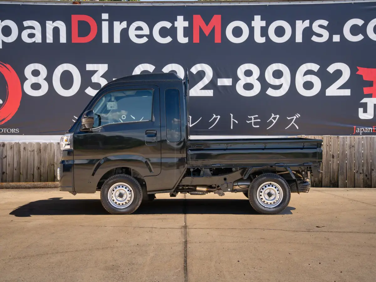 2024 Daihatsu Hijet, a black off-road Kei Truck, for sale at Japan Direct Motors in Irmo, SC (photo 10 of 13)