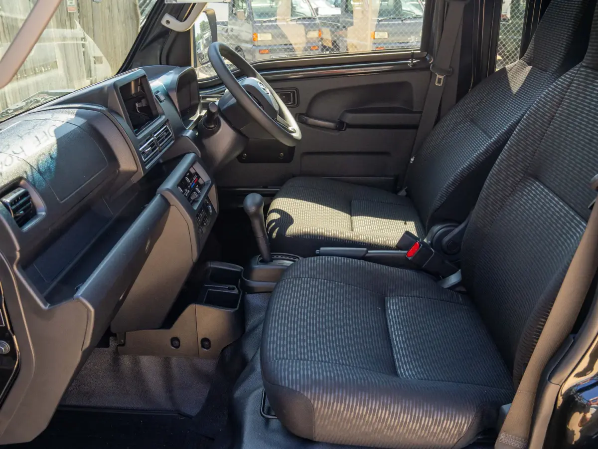 2024 Daihatsu Hijet, a black off-road Kei Truck, for sale at Japan Direct Motors in Irmo, SC (photo 12 of 13)