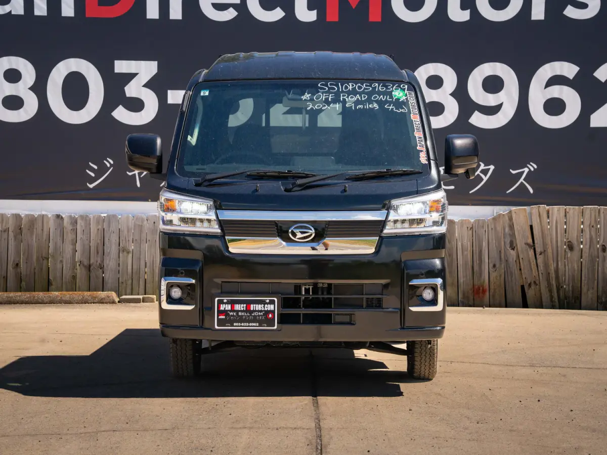 2024 Daihatsu Hijet, a black off-road Kei Truck, for sale at Japan Direct Motors in Irmo, SC (photo 4 of 13)