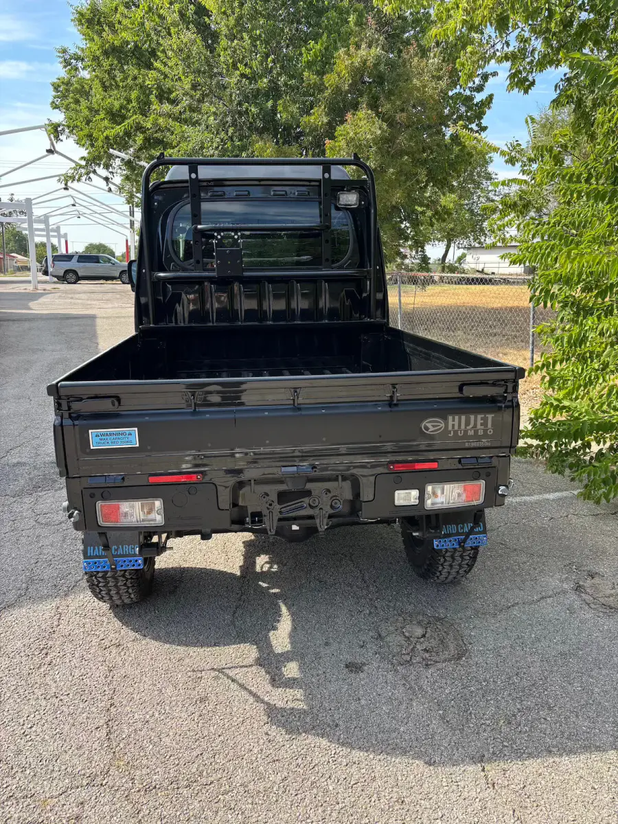2025 Daihatsu Hijet Jumbo Hard Cargo Edition, a black off-road Kei Truck, for sale at Weatherford Mini Trucks in Weatherford, TX (photo 3 of 8)