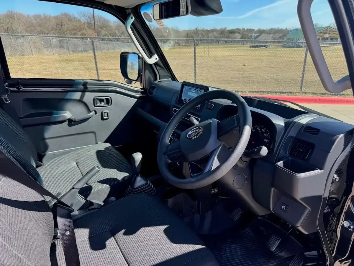 2025 Daihatsu Hijet Jumbo Hard Cargo Edition, a black off-road Kei Truck, for sale at Weatherford Mini Trucks in Weatherford, TX (photo 5 of 8)