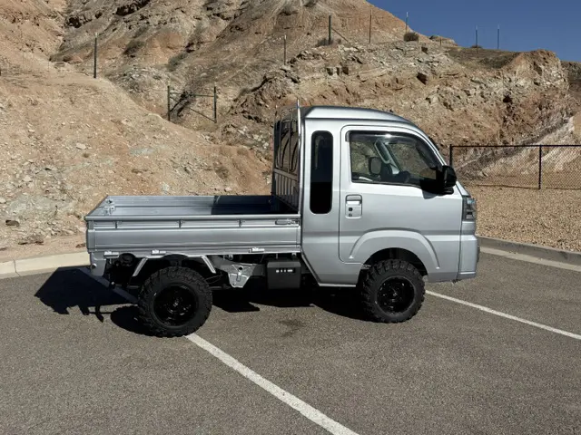 2025 Daihatsu Hijet Jumbo, a silver off-road Kei Truck, for sale at Mini Monsters USA in St. George, UT (photo 2 of 23)