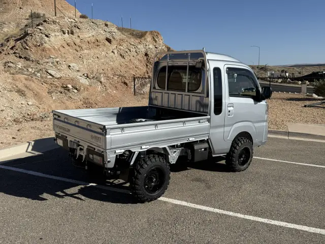 2025 Daihatsu Hijet Jumbo, a silver off-road Kei Truck, for sale at Mini Monsters USA in St. George, UT (photo 3 of 23)