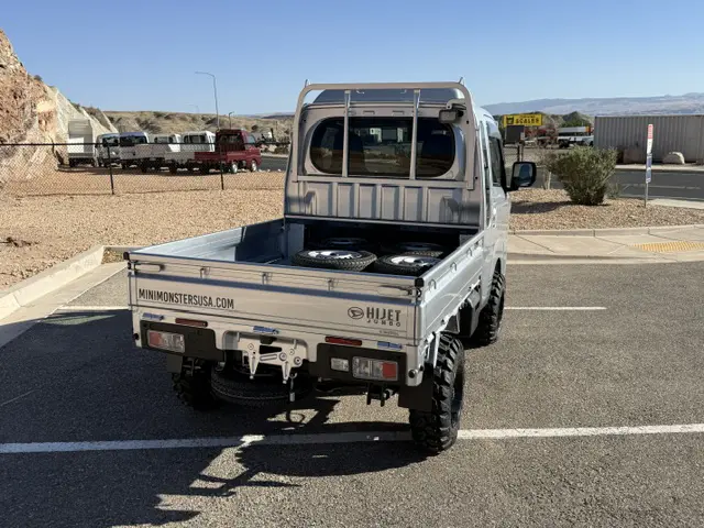 2025 Daihatsu Hijet Jumbo, a silver off-road Kei Truck, for sale at Mini Monsters USA in St. George, UT (photo 4 of 23)