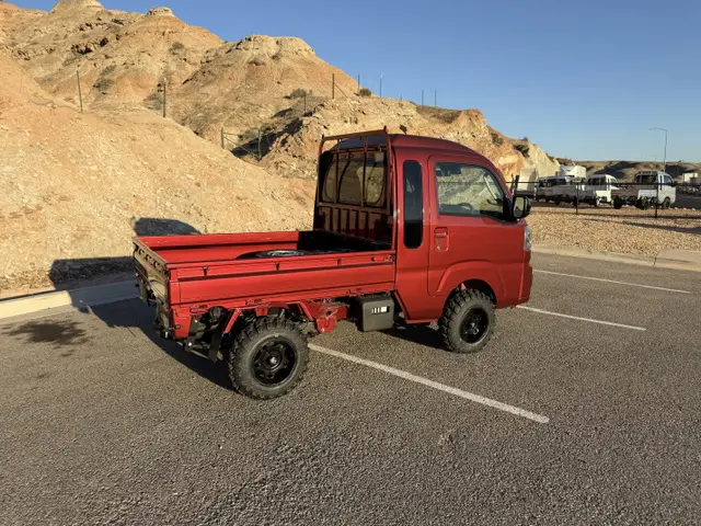 2025 Daihatsu Hijet Jumbo, a red off-road Kei Truck, for sale at Mini Monsters USA in St. George, UT (photo 1 of 23)