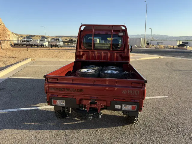 2025 Daihatsu Hijet Jumbo, a red off-road Kei Truck, for sale at Mini Monsters USA in St. George, UT (photo 5 of 23)