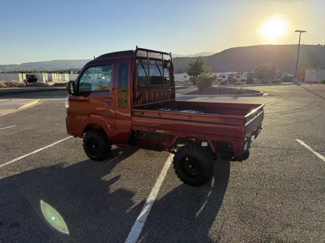 2025 Daihatsu Hijet Jumbo, a red off-road Kei Truck, for sale at Mini Monsters USA in St. George, UT (photo 6 of 23)