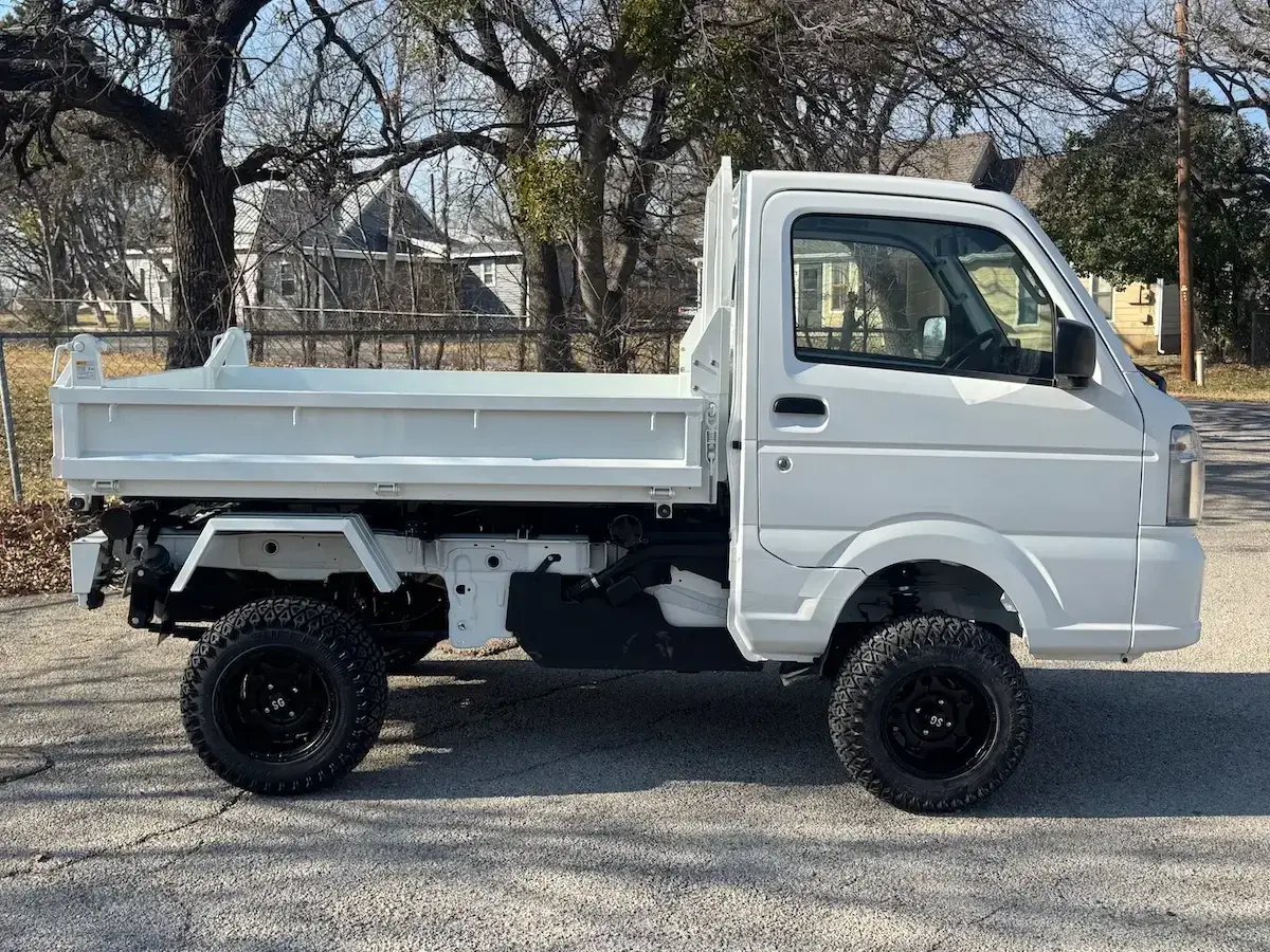 2025 Suzuki Carry Scissor/Dump Lift, a white off-road Kei Truck, for sale at Weatherford Mini Trucks in Weatherford, TX (photo 3 of 12)