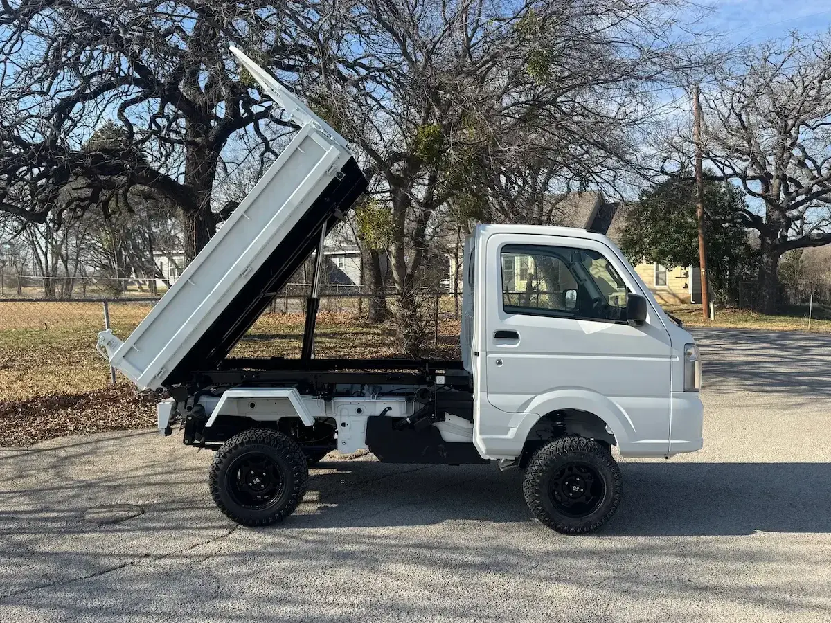 2025 Suzuki Carry Scissor/Dump Lift, a white off-road Kei Truck, for sale at Weatherford Mini Trucks in Weatherford, TX (photo 5 of 12)