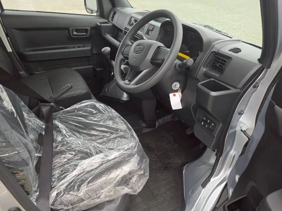 2026 Daihatsu Hijet Deck Van, a silver off-road Kei Truck, for sale at Mini Monsters USA in St. George, UT (photo 3 of 14)
