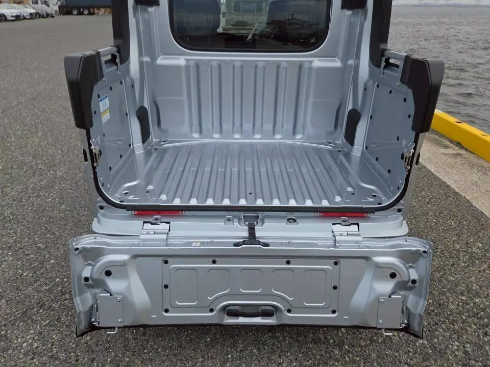 2026 Daihatsu Hijet Deck Van, a silver off-road Kei Truck, for sale at Mini Monsters USA in St. George, UT (photo 7 of 14)