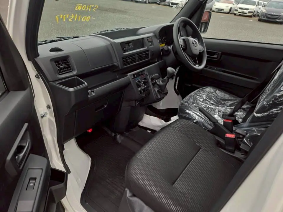 2026 Daihatsu Hijet Deck Van, a white off-road Kei Truck, for sale at Mini Monsters USA in St. George, UT (photo 16 of 17)