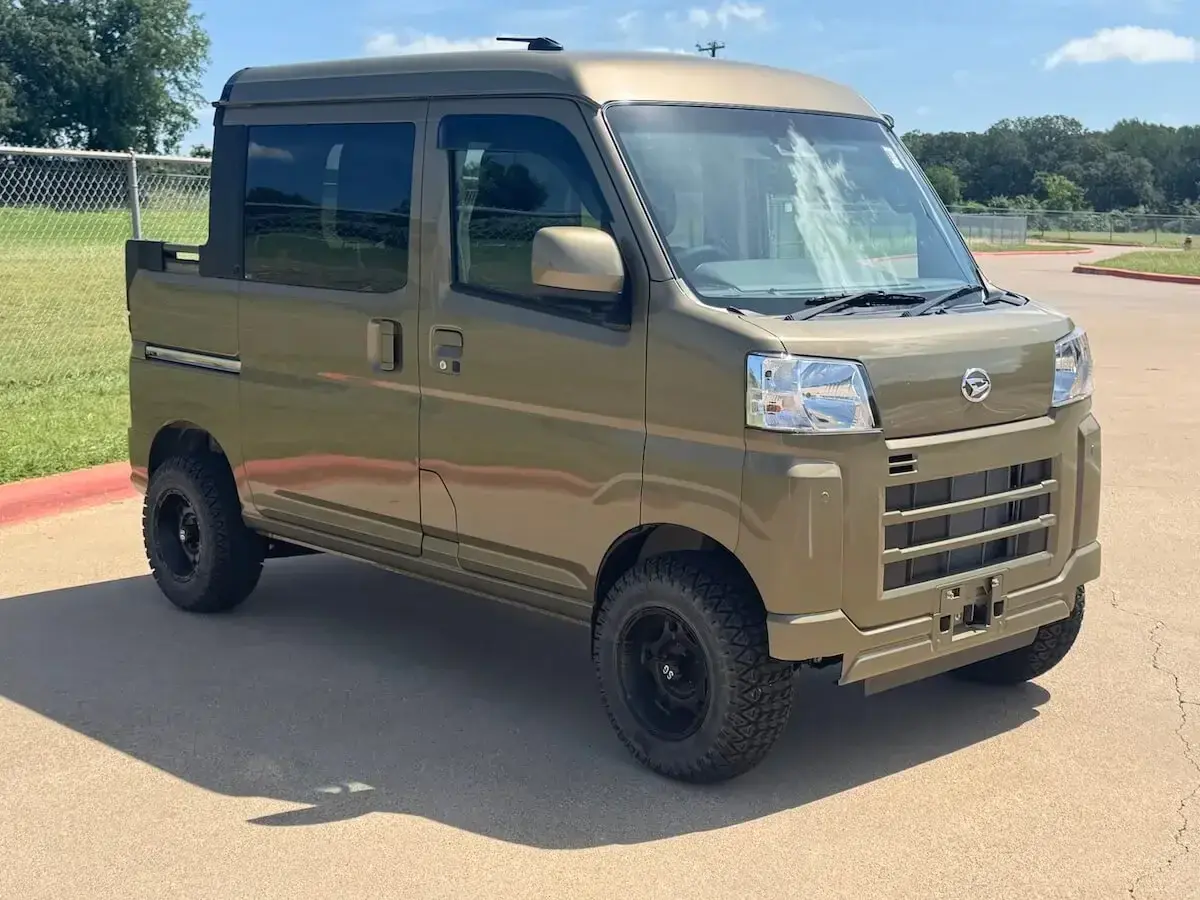 2026 Daihatsu Hijet Deck Van, a khaki green off-road Kei Truck, for sale at Weatherford Mini Trucks in Weatherford, TX (photo 1 of 12)