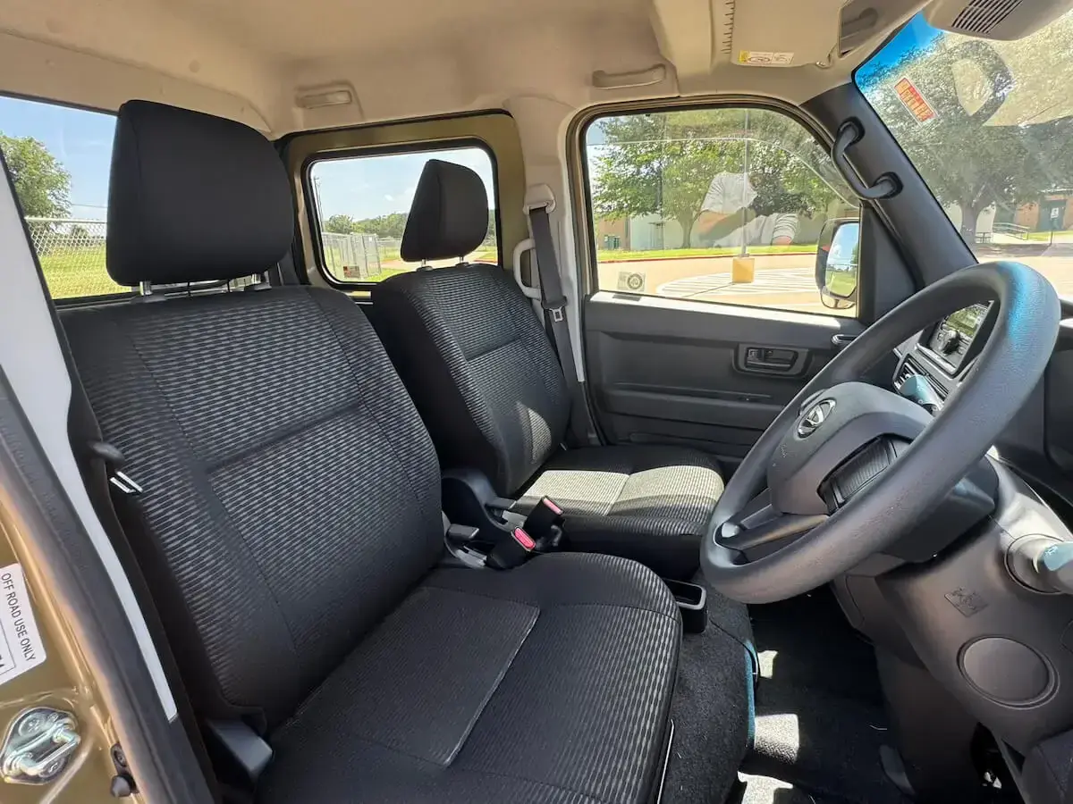 2026 Daihatsu Hijet Deck Van, a khaki green off-road Kei Truck, for sale at Weatherford Mini Trucks in Weatherford, TX (photo 12 of 12)