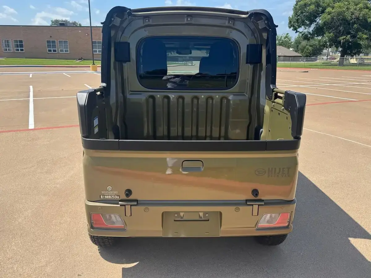 2026 Daihatsu Hijet Deck Van, a khaki green off-road Kei Truck, for sale at Weatherford Mini Trucks in Weatherford, TX (photo 2 of 12)