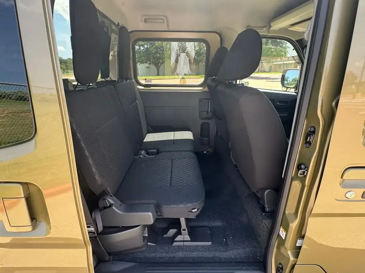 2026 Daihatsu Hijet Deck Van, a khaki green off-road Kei Truck, for sale at Weatherford Mini Trucks in Weatherford, TX (photo 5 of 12)