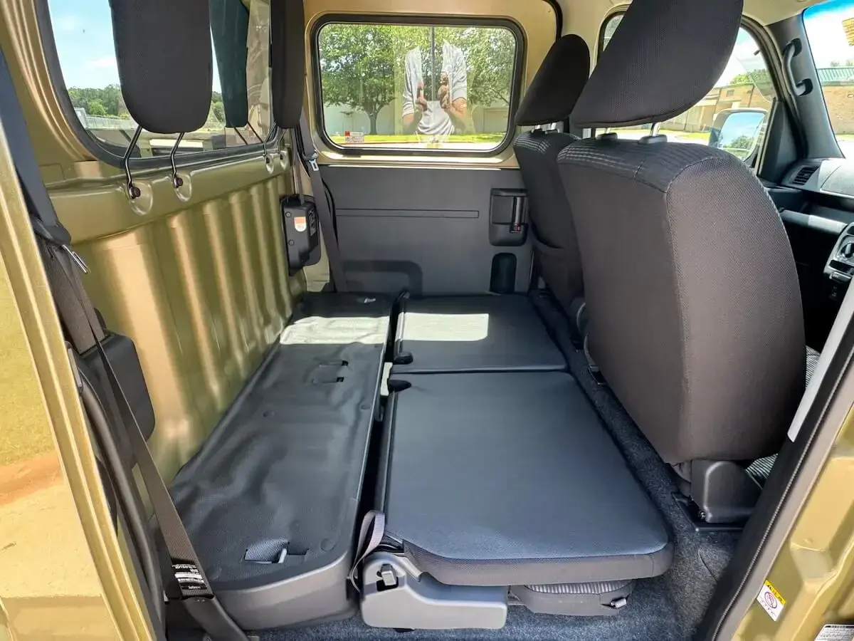 2026 Daihatsu Hijet Deck Van, a khaki green off-road Kei Truck, for sale at Weatherford Mini Trucks in Weatherford, TX (photo 6 of 12)
