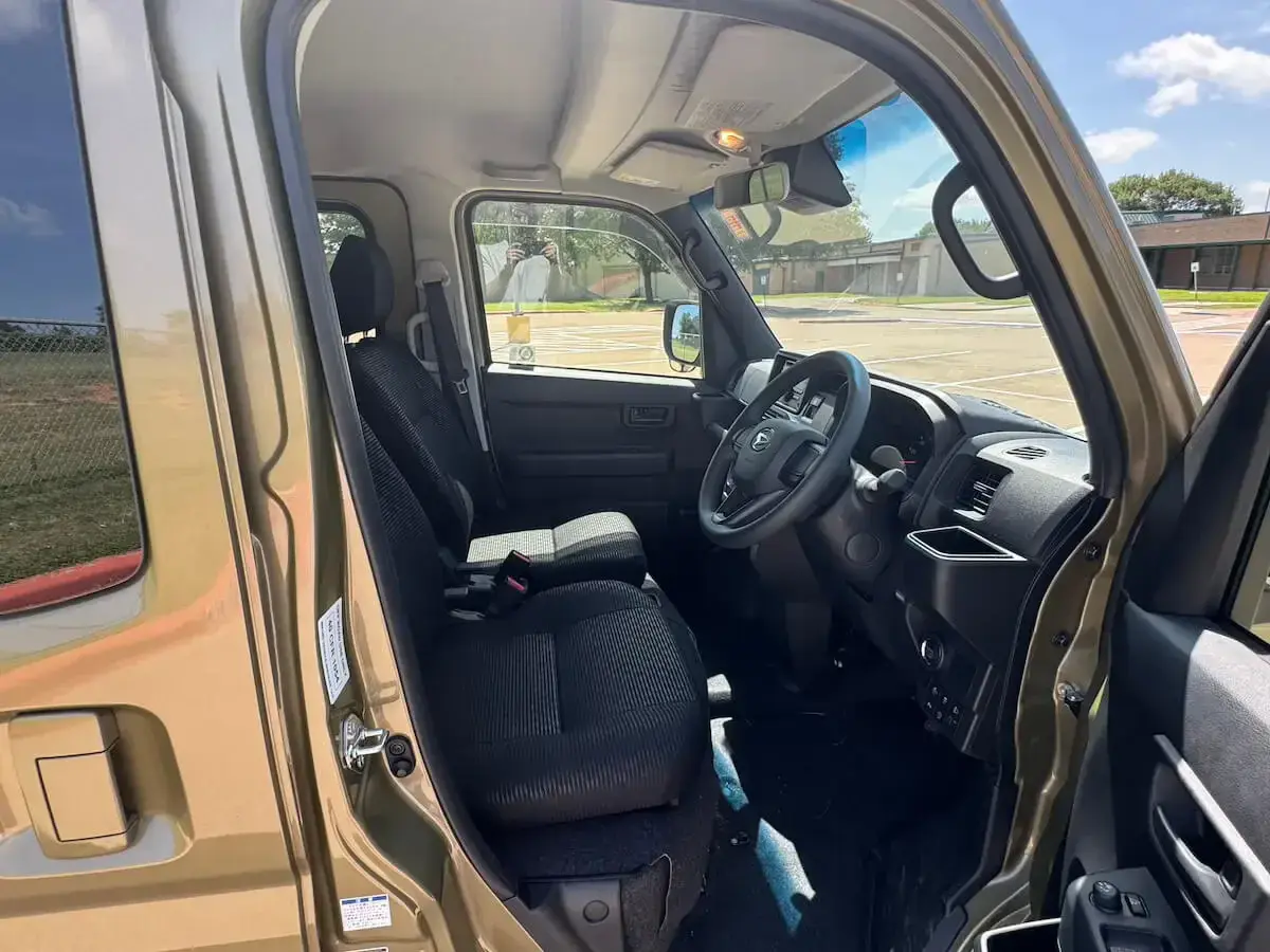 2026 Daihatsu Hijet Deck Van, a khaki green off-road Kei Truck, for sale at Weatherford Mini Trucks in Weatherford, TX (photo 7 of 12)