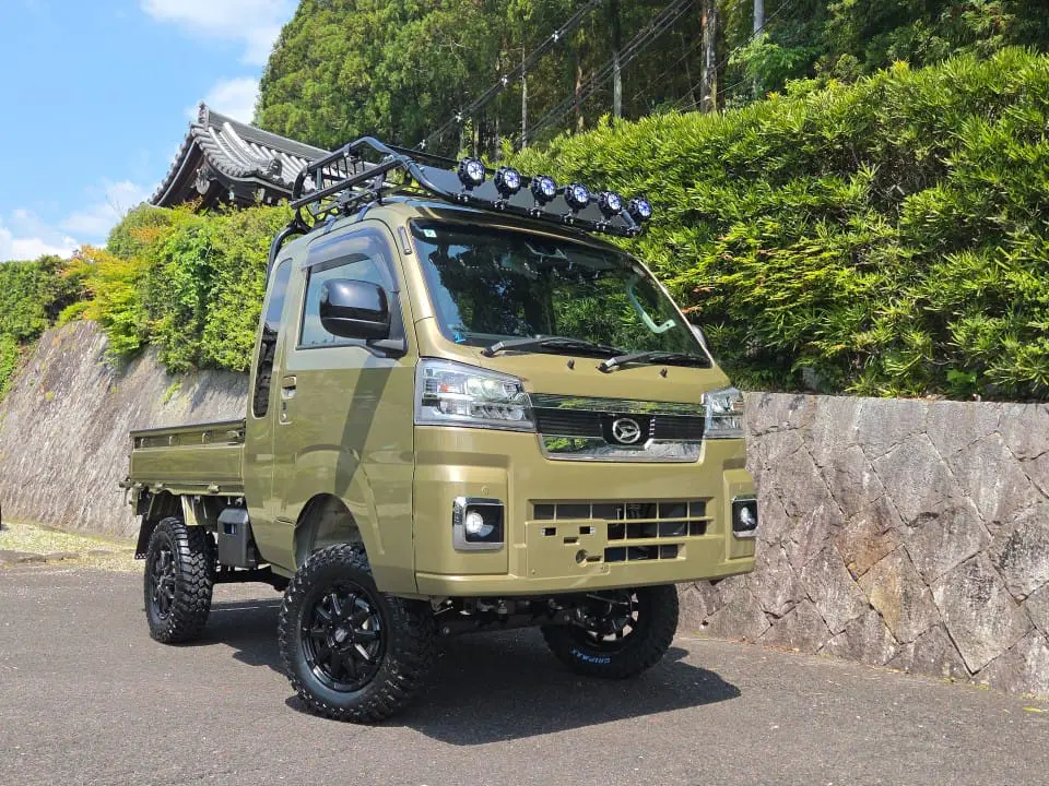 2026 Daihatsu Hijet Extreme, a green off-road Kei Truck, for sale at Mini Monsters USA in St. George, UT (photo 3 of 16)