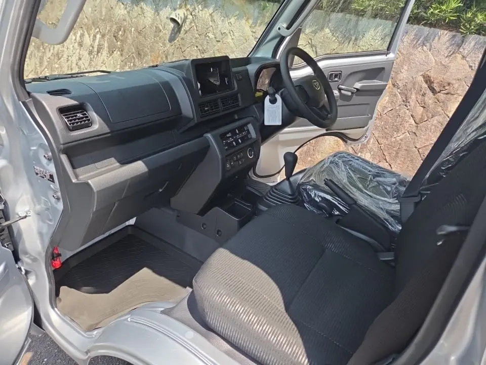 2026 Daihatsu Hijet Extreme, a silver off-road Kei Truck, for sale at Mini Monsters USA in St. George, UT (photo 16 of 19)