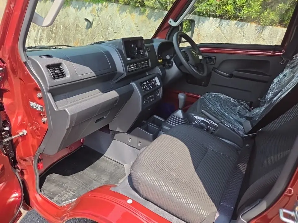 2026 Daihatsu Hijet Extreme, a red off-road Kei Truck, for sale at Mini Monsters USA in St. George, UT (photo 11 of 19)