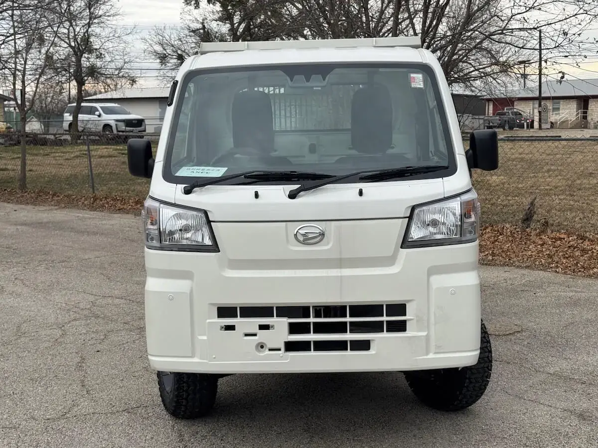 2026 Daihatsu Hijet HD Dump, a white off-road Kei Truck, for sale at Weatherford Mini Trucks in Weatherford, TX (photo 4 of 7)