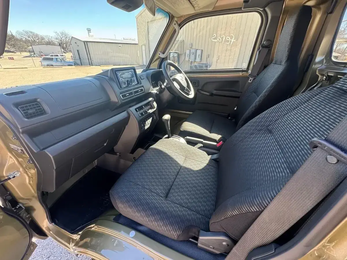 2026 Daihatsu Hijet Jumbo Cab Farming Package, a khaki green off-road Kei Truck, for sale at Weatherford Mini Trucks in Weatherford, TX (photo 4 of 8)
