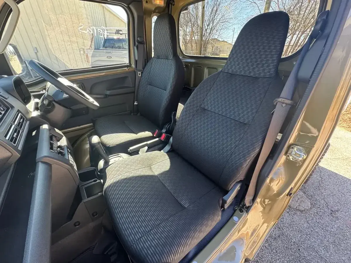 2026 Daihatsu Hijet Jumbo Cab Farming Package, a khaki green off-road Kei Truck, for sale at Weatherford Mini Trucks in Weatherford, TX (photo 2 of 8)