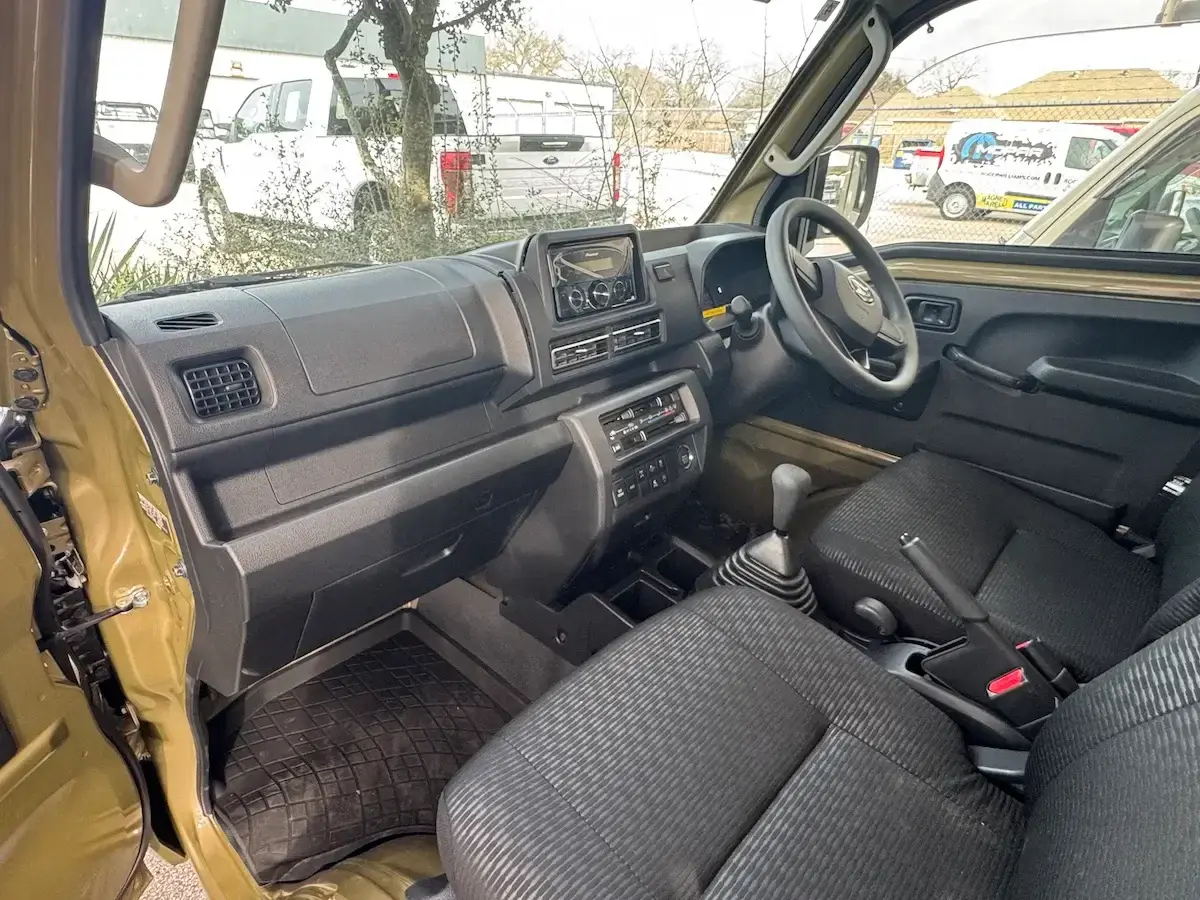 2026 Daihatsu Hijet Jumbo-Farming Package, a khaki green off-road Kei Truck, for sale at Weatherford Mini Trucks in Weatherford, TX (photo 10 of 10)