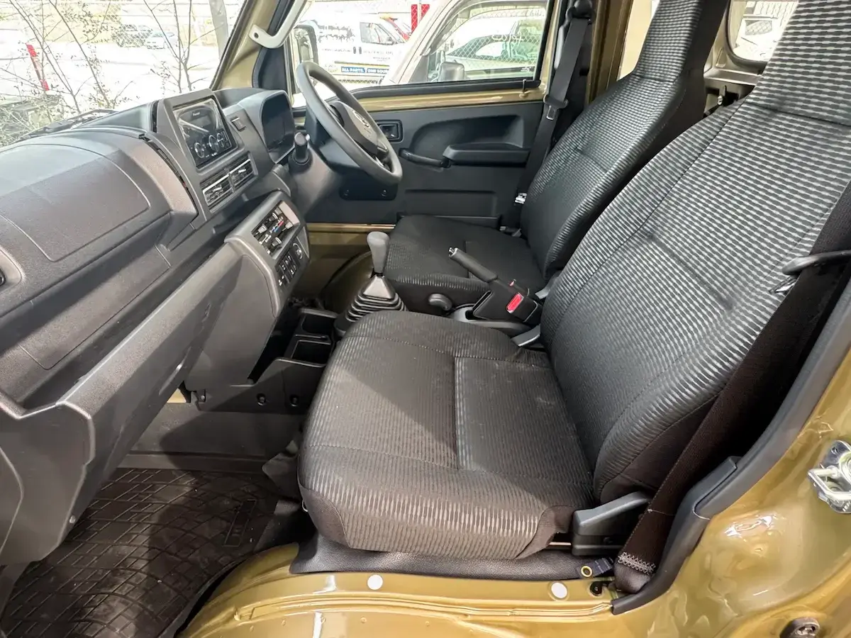 2026 Daihatsu Hijet Jumbo-Farming Package, a khaki green off-road Kei Truck, for sale at Weatherford Mini Trucks in Weatherford, TX (photo 4 of 10)
