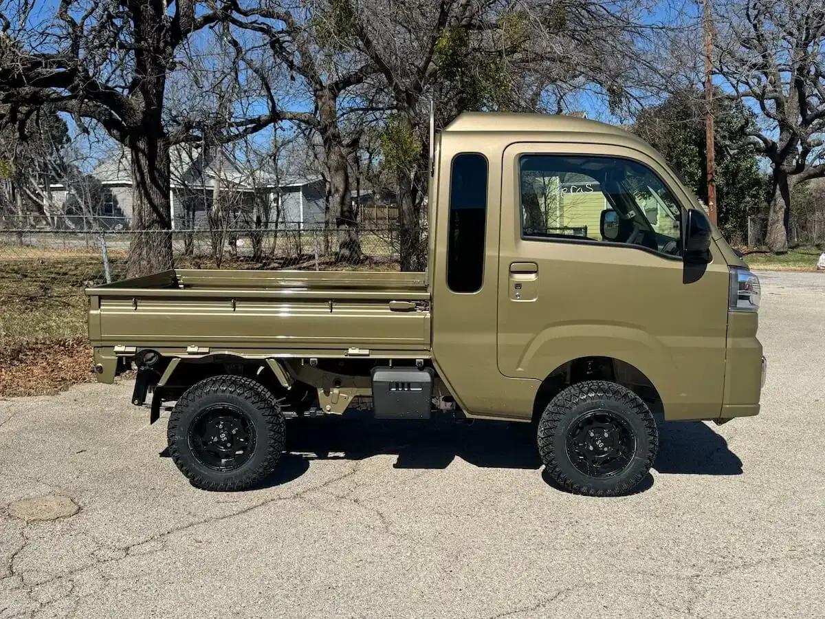 2026 Daihatsu Hijet Jumbo-Farming Package, a khaki green off-road Kei Truck, for sale at Weatherford Mini Trucks in Weatherford, TX (photo 5 of 10)