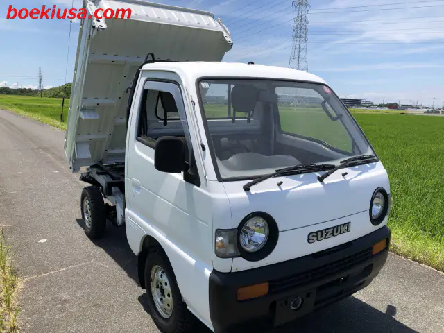 1991 Suzuki Carry Dump 4x4, a white Kei Truck, for sale at Boeki USA in Paterson, NJ