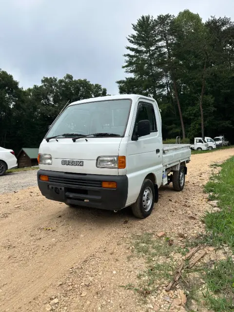 1995 Suzuki Carry 4WD, a white Kei Truck, for sale at Mayberry Mini Trucks in Mount Airy, NC