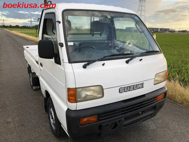 1996 Suzuki Carry 4x4, a white Kei Truck, for sale at Boeki USA in Paterson, NJ