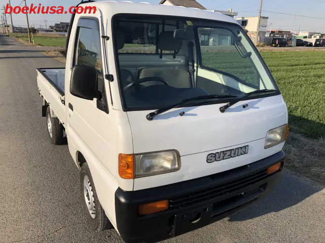 1996 Suzuki Carry 4x4, a white Kei Truck, for sale at Boeki USA in Paterson, NJ