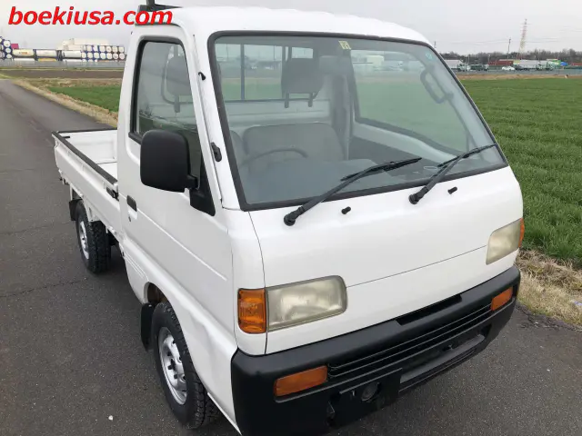 1996 Suzuki Carry 4x4, a white Kei Truck, for sale at Boeki USA in Paterson, NJ