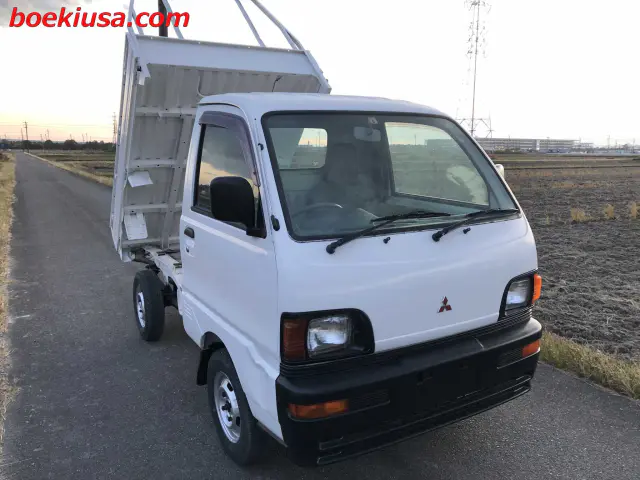 1997 Mitsubishi Minicab Dump 4x4, a white Kei Truck, for sale at Boeki USA in Paterson, NJ