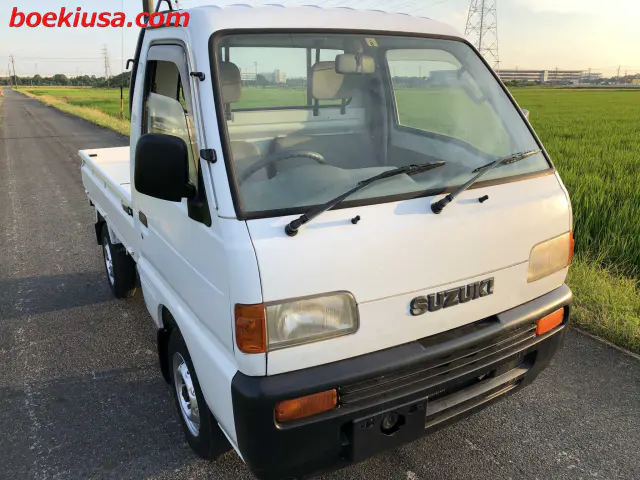 1998 Suzuki Carry 4x4, a white Kei Truck, for sale at Boeki USA in Paterson, NJ