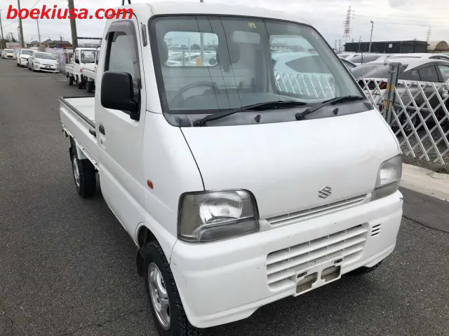 1999 Suzuki Carry 4x4, a white Kei Truck, for sale at Boeki USA in Paterson, NJ