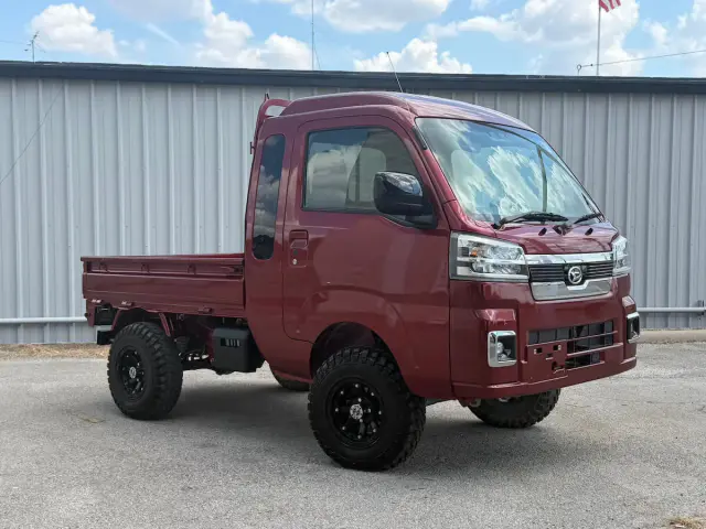 2023 Daihatsu Hijet Jumbo Cab, a red off-road Kei Truck, for sale at Weatherford Mini Trucks in Weatherford, TX