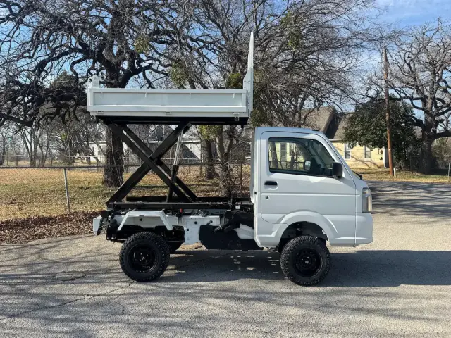 2025 Suzuki Carry Scissor/Dump Lift, a white off-road Kei Truck, for sale at Weatherford Mini Trucks in Weatherford, TX